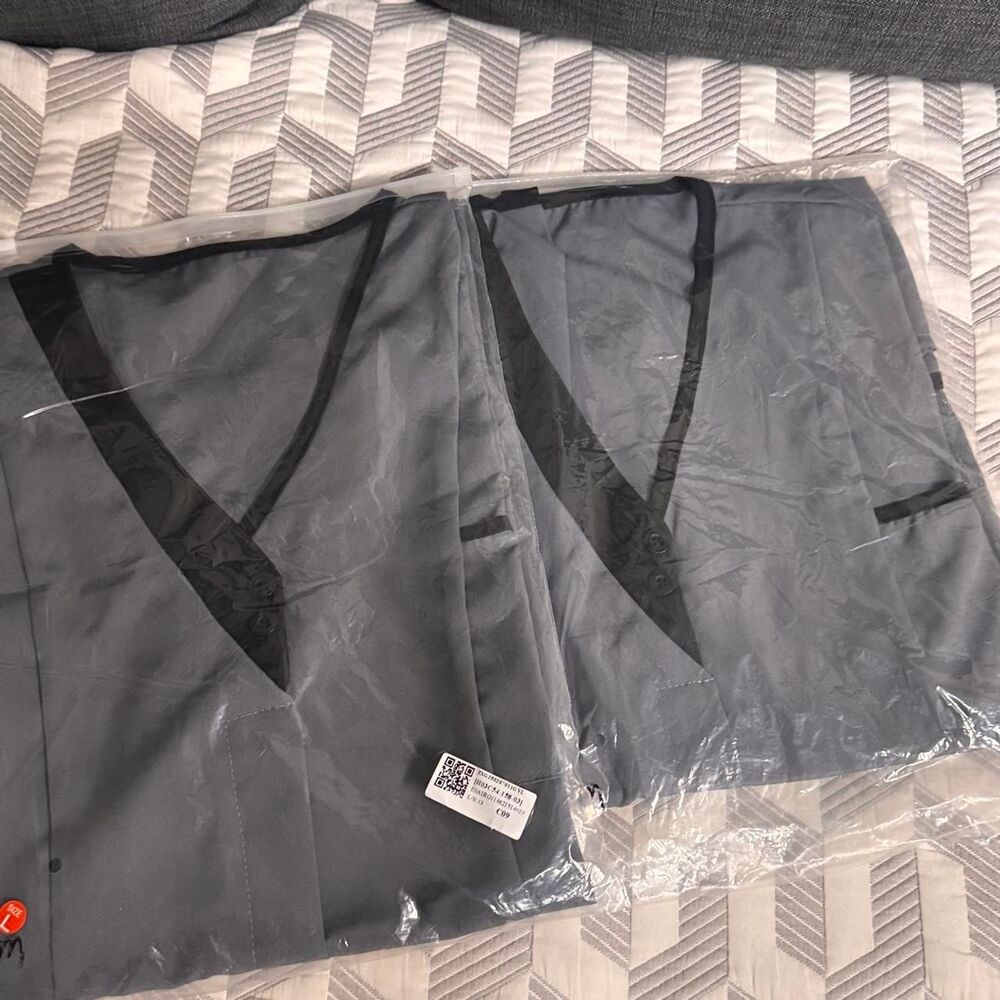 Gray scrub tops with black trim